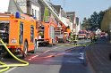 Feuer 3 Dachstuhlbrand Koeln Rath Heumar Gut Maarhausen Eilerstr P259